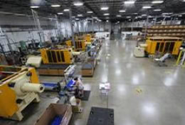 AdvanTech Plastics plant floor showing plastic injection molding machines
